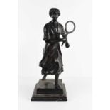 E. Loisauy: a bronze figure of a female tennis player, on a stepped base, signed to the back, 41cm