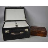 A 20th century doctor's bag with fold down side revealing four graduated drawers, 22 by 41 by 32cm