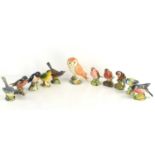 A group of eleven Beswick birds comprising of an Owl 2026, Grey wagtail 1041, Whitethroat 2106,