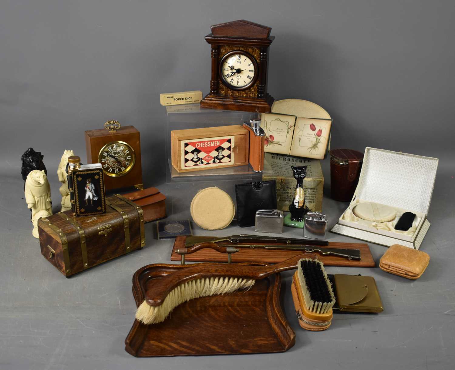 A group of gentleman's collectables, to include hip flasks, petrol lighters, dressing table set,