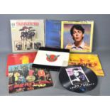 A group of Beatles and Paul McCartney LP records and tour programmes to include Paul McCartney "