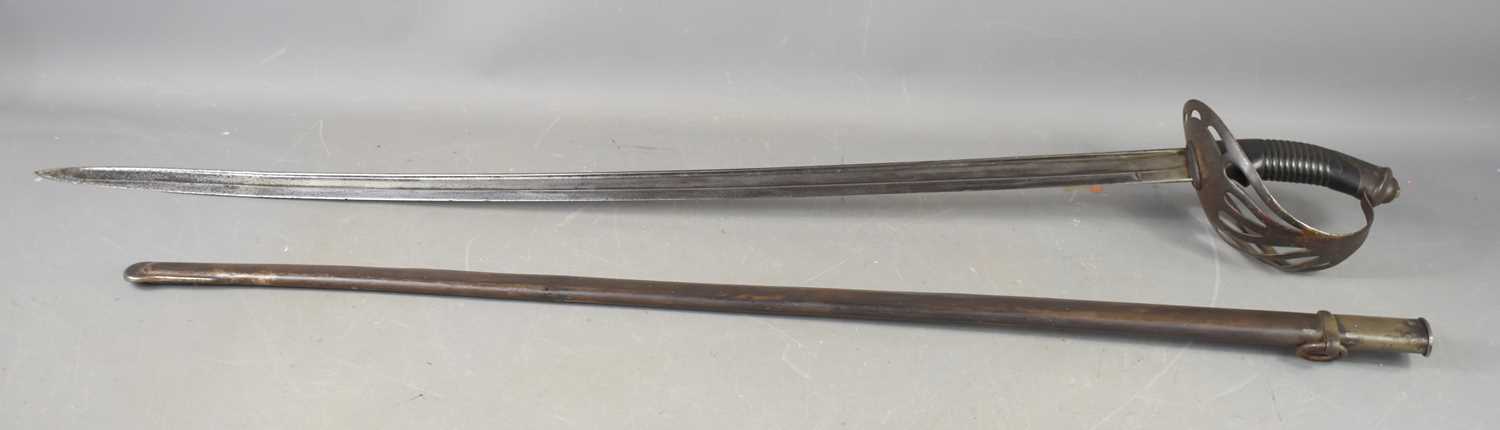 A 19th century Argentinian, French made cavalry sword, the slightly curved, fullered blade marked