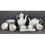 A Royal Copenhagen tea set, comprising six cups, saucers and plates, coffee pot, tea pot, sugar bowl