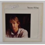 A Snowy White autographed vinyl record, signed top left.