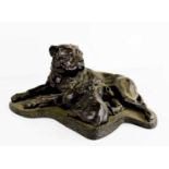 A 20th century resin bronzed group of a dog and her pups, 33cm long.