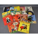 A group of children's and classical vintage vinyl 45 records, including Histoire de Babar, Le