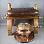 An Iranian camel stool together with a copper chafing dish on stand and tray.