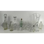 A group of glassware to include decanters, 19th century port glasses, bottles, jug and others.