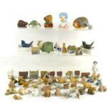 A group of Wade Whimsies to include Wade houses, Humpty Dumpty, Dogs, Hedgehog and others,