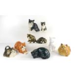 A group of five Mike Hinton "Winstanley" pottery cats together with four unmarked pottery cats.