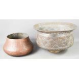 Two Iranian/Middle Eastern antique silvered copper bowls, one profusely decorated with embossed