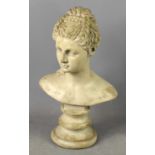 A composite bust of classical female raised on a circular base, 32cm.