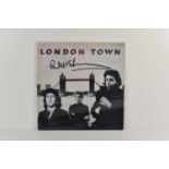 An autographed Wings "London Town" vinyl record, signed by Paul McCartney.