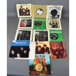 A group of Beatles 45's including Love me Do, 7XCE, 17144-2, Please Please Me, 7XCE, 17217-3, and