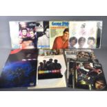 A group of vinyl records, some signed to include Cliff Richard "I'm Nearly Famous" signed LP, The