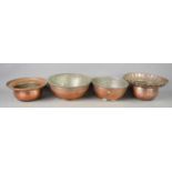 Four Iranian/Middle Eastern silvered copper bowls, each of different style and form; one with a