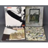 Led Zeppelin: a group of four vinyl albums comprising Led Zeppelin, K40031 A1, Led Zepplin II,