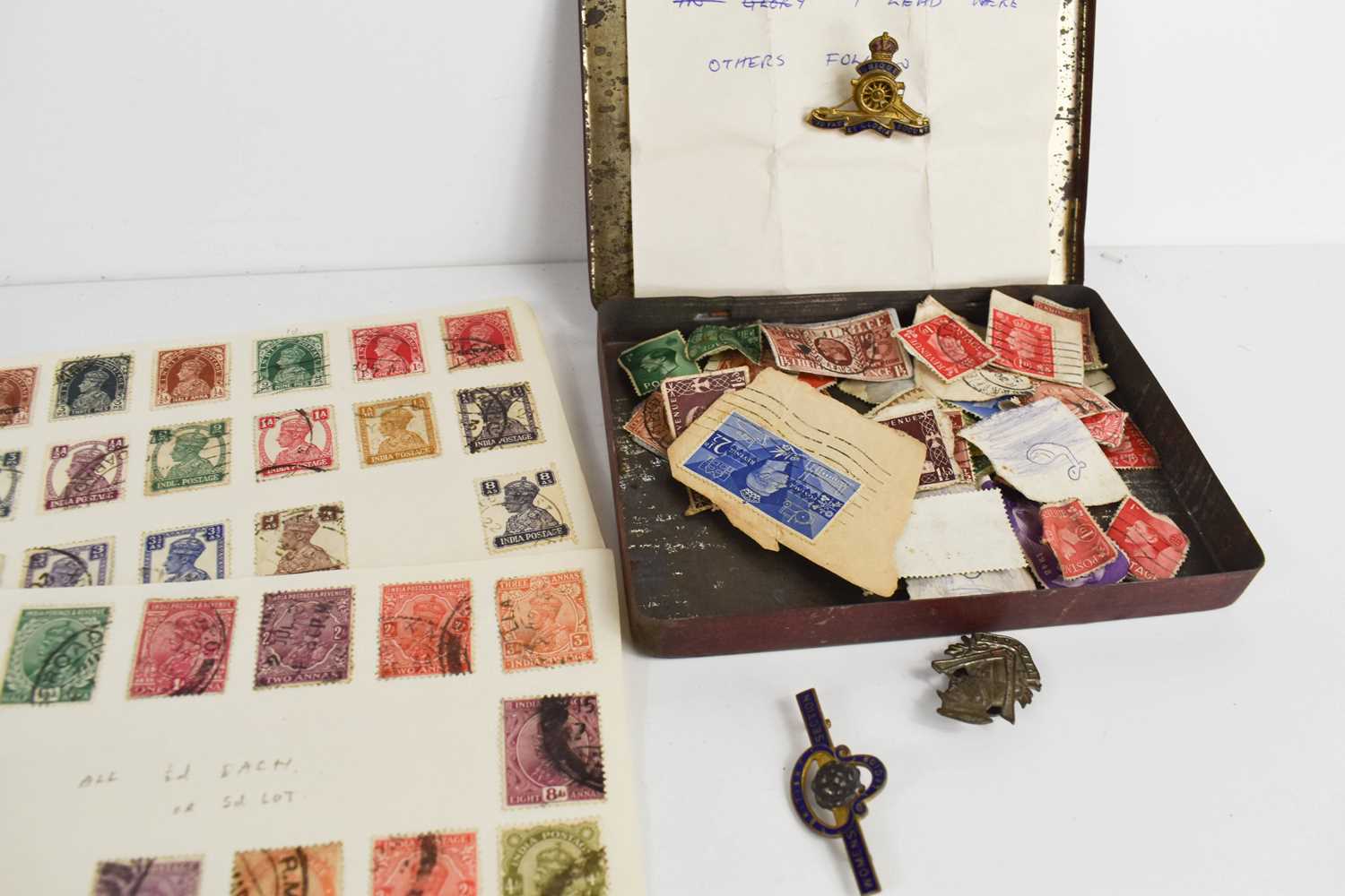 An album of stamps including Edwardian examples, loose stamps, military badges and Wade Whimsies. - Image 2 of 2