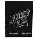 An autographed Johnny Cash Silver Anniversary tour programme, signed by Johnny Cash and his wife