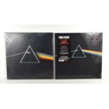 A Pink Floyd "Dark Side of the Moon" LP, 1973 release, with stickers, Q4SHVL 804 together with a