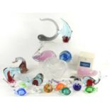 A group of glass paperweights and animal ornaments to include examples by Caithness, Wedgwood and