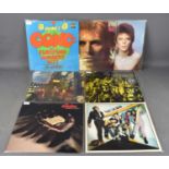 A group of vintage vinyl albums including David Bowie, Bowie Pinups, INTS 5236, The Rise and Fall of