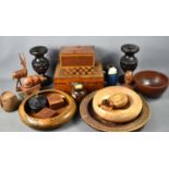 A group of treen to include a Victorian parquetry inlaid box, wooden bowls, carved hardwood
