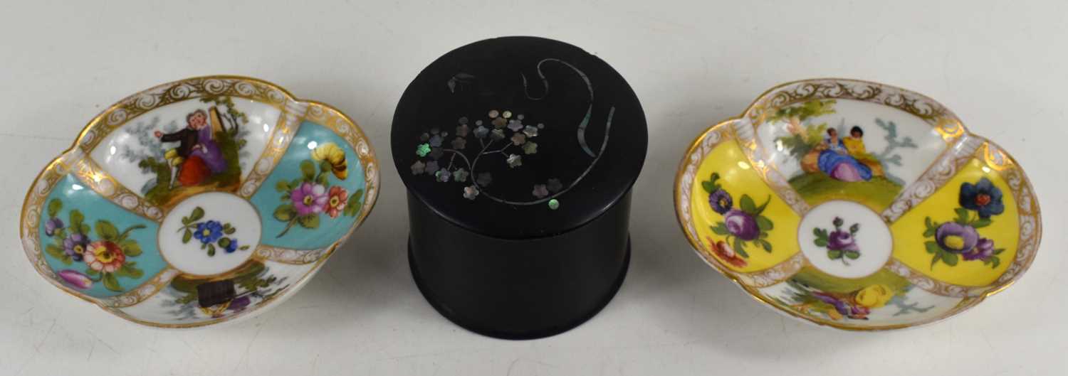 A 19th century ebonised powder pot inlaid with mother of pearl together with two continental pin