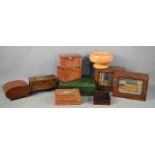A selection of various boxes, including one in the form of a coffer, a treen bowl, and a leather