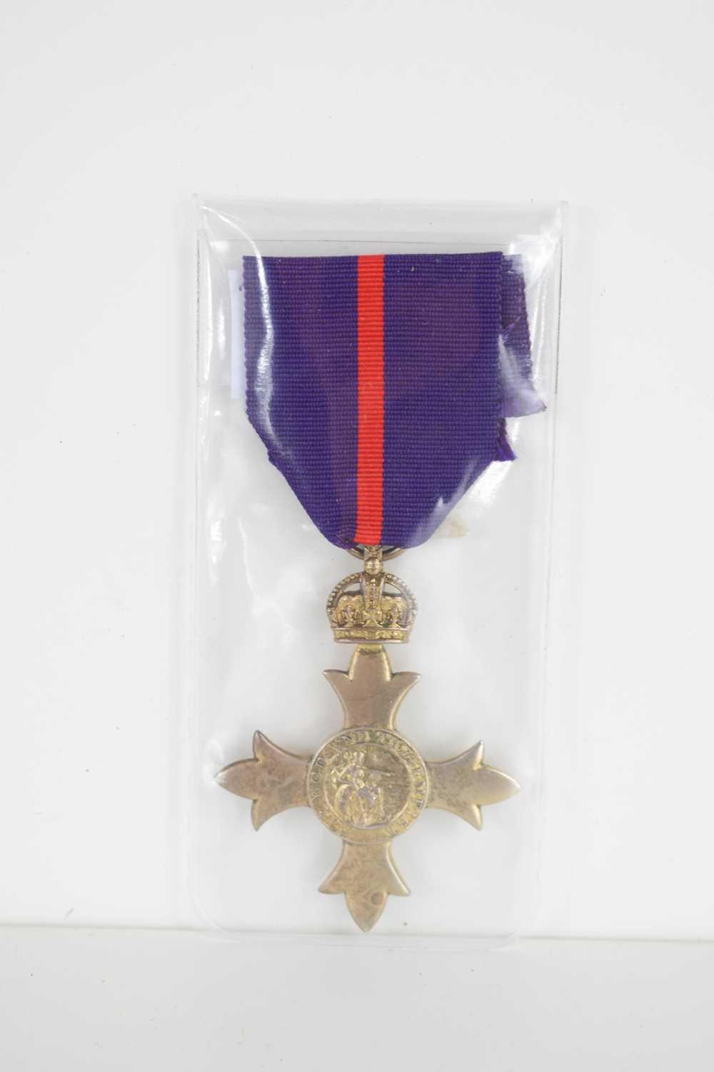 A silver hallmarked military OBE medal, unnamed, no case.