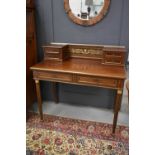 A French Empire style bureau plat with brass stringing and inlay, 99cms tall by 105cms long by 54cms