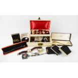 A jewellery box containing jewellery, compacts, watches, a silver necklace and earrings set,