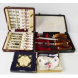 A set of Royal Crown Derby porcelain handled knives in original box, together with dish and knife