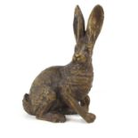 A bronze sculpture modelled in the form of a hare, 32cm high.