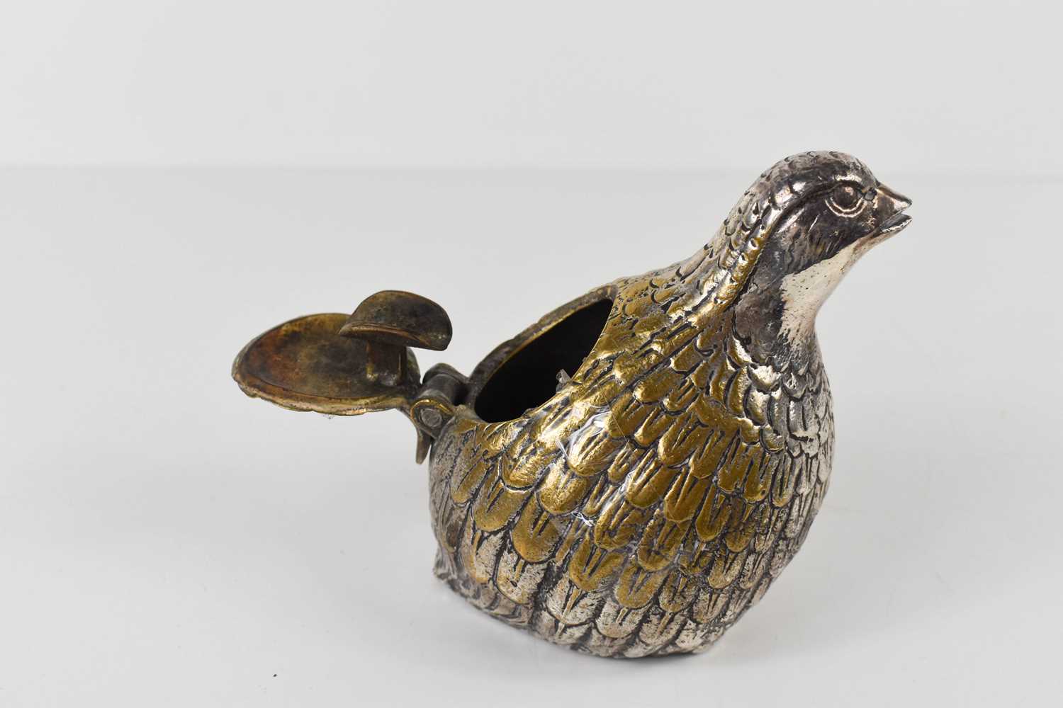 A silver plated novelty ashtray in the form of a quail, with hinged tail, opening to reveal cigar - Image 2 of 2