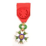 An 1870-1951 French Legion d'Honneur medal, mounted on red ribbon with rosette.