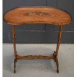 A 19th century satinwood and painted kidney shaped side table, decorated with painted cherubs,