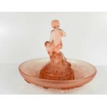 A Peter Pan and Wendy pink frosted glass centrepiece, of three sections, with central moulded