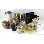 A collection of Victorian and later jugs, to include lustreware examples, and two Carlton Ware