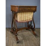 A Regency mahogany worktable, fitted with side drawers to the top, standing on lyre shaped