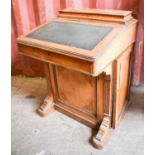 A 19th century mahogany davenport, with pop up back, leather writing slope enclosing fitted