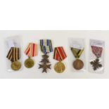 A group of WWII medals to include a Bavarian Military Merit Cross, Chechoslavakia 1939 cross, Soviet