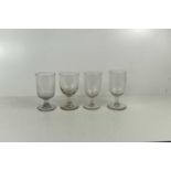 A group of four similar 19th century rummer type glasses.