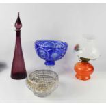 A Bohemian blue cut glass pedestal bowl an orange glass 1970s parafin lamp, amethyst coloured bottle