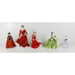 A group of five porcelain ladies; Royal Doulton Christmas Rose and Christmas Celebration, a Coalport