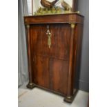 A French Empire style secretaire with gilt metal mounts, 149cms tall by 101cms long by 48cms deepThe
