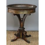 A 19th century Regency rosewood and gilt carved jardinere stand with brass inlaid decoration,