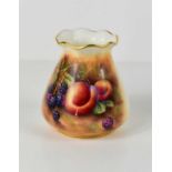 A Royal Worcester money bag shaped vase painted with fruit, by peaches and blackberries, 12cm high.