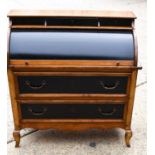 A modern hardwood bureau with painted fall front and two drawers raised on short cabriole legs,