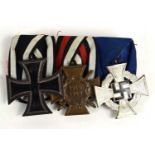 A WWI German medal group comprising of the Imperial Iron Cross, Honour Cross medal and the Civil